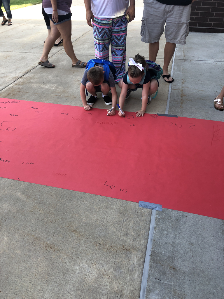 Signing the red carpet 